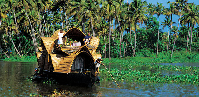 Kerala Houseboat ride through the backwaters of Alleppey.