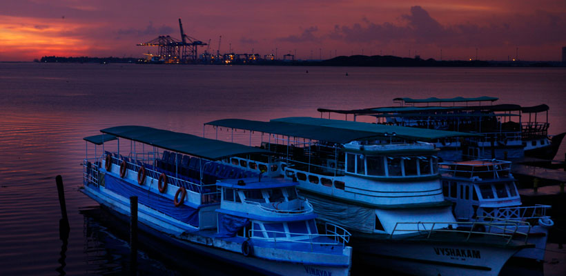 A spectacular view of tourists boats at Marine Drive in Kochi