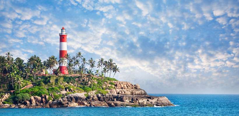 A picturesque view of Kovalam lighthouse beach in Kerala.