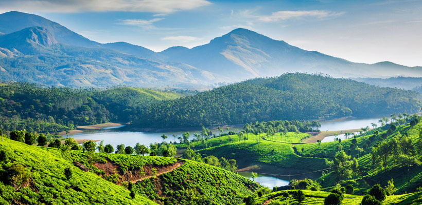 A spectacular view of Tea plantations and Muthirappuzhayar River in hills near Munnar, Kerala