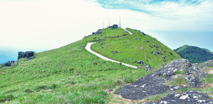 A picturesque view of Ponmudi hills peak in Trivandrum.
